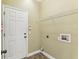 Laundry room with washer/dryer hookups and storage at 13212 Phoenix Dr, Orlando, FL 32828