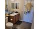 Bathroom with toilet, sink, and shower at 1910 Nw 85Th Loop, Ocala, FL 34475