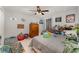 Bright bedroom with a double bed and plenty of toys at 157 Primrose Dr, Davenport, FL 33837