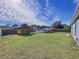 Spacious backyard with shed, above ground pool, and grassy area at 1621 Saddlehorn Dr, Lakeland, FL 33810