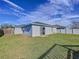 Large backyard with grassy area and a partially visible home at 1621 Saddlehorn Dr, Lakeland, FL 33810