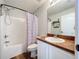 Simple bathroom with a shower/tub combo and a vanity at 1621 Saddlehorn Dr, Lakeland, FL 33810