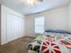 Charming bedroom with a bed, dresser and ceiling fan at 1621 Saddlehorn Dr, Lakeland, FL 33810