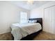 Comfortable bedroom with a double bed and ample closet space at 1621 Saddlehorn Dr, Lakeland, FL 33810
