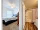 Bedroom with a bed and en-suite bathroom at 1621 Saddlehorn Dr, Lakeland, FL 33810