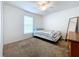 Cozy bedroom with a twin bed and a full-length mirror at 1621 Saddlehorn Dr, Lakeland, FL 33810