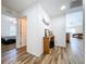 Open entryway with wood-look floors and view into living areas at 1621 Saddlehorn Dr, Lakeland, FL 33810