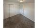 Spacious bedroom with carpet and double closets at 3709 Blarney Dr, Orlando, FL 32808