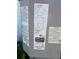 Detailed label of an air conditioning unit, including serial number and safety warnings at 2150 Ne 54Th St, Ocala, FL 34479