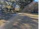 Large backyard with mature trees at 2150 Ne 54Th St, Ocala, FL 34479