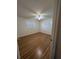 Bright bedroom with laminate wood flooring and ceiling fan at 2150 Ne 54Th St, Ocala, FL 34479
