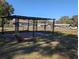 Backyard patio with ornate metal covering at 2150 Ne 54Th St, Ocala, FL 34479