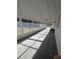 Sunroom with gray carpeting and many windows at 2150 Ne 54Th St, Ocala, FL 34479