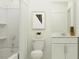 Clean bathroom with shower/tub combo, white vanity, and framed art at 776 Osprey Roost Dr, Lakeland, FL 33801