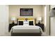 Bedroom with a bed, nightstands, and periodic table print at 776 Osprey Roost Dr, Lakeland, FL 33801