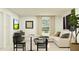 Relaxing living room featuring a sectional sofa and a small dining set at 776 Osprey Roost Dr, Lakeland, FL 33801