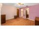 Bright bedroom with wood floors and access to bathroom at 9210 Lehall W Sq, Lakeland, FL 33810