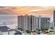 Aerial view of beachfront building at sunrise at 3737 S Atlantic Ave # 204, Daytona Beach Shores, FL 32118