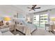 Primary bedroom with king bed and access to balcony at 3737 S Atlantic Ave # 204, Daytona Beach Shores, FL 32118