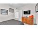 Bedroom with dresser and a TV at 3737 S Atlantic Ave # 204, Daytona Beach Shores, FL 32118