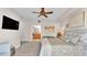 Primary bedroom with king bed and en-suite bathroom at 3737 S Atlantic Ave # 204, Daytona Beach Shores, FL 32118