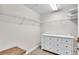 Walk-in closet with a dresser and shelving at 3737 S Atlantic Ave # 204, Daytona Beach Shores, FL 32118
