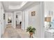 Hallway with light tile floors and access to bedrooms at 3737 S Atlantic Ave # 204, Daytona Beach Shores, FL 32118