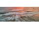 Aerial view of ocean waves at sunset at 3737 S Atlantic Ave # 204, Daytona Beach Shores, FL 32118