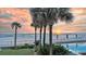 Oceanfront pool and patio area at sunrise at 3737 S Atlantic Ave # 204, Daytona Beach Shores, FL 32118