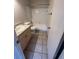 Clean bathroom with tub, toilet, and vanity at 3992 Crayrich Cir # C3, Orlando, FL 32839