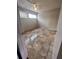 Spacious bedroom with tile flooring and ceiling fan at 3992 Crayrich Cir # C3, Orlando, FL 32839