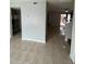 View of dining area with tile flooring and access to kitchen at 3992 Crayrich Cir # C3, Orlando, FL 32839