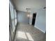 Spacious living room with tile flooring and ample natural light at 3992 Crayrich Cir # C3, Orlando, FL 32839