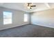 Spacious bedroom with neutral walls and carpeted flooring at 16962 Sw 40Th Cir, Ocala, FL 34473