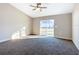 Serene bedroom with sliding glass doors leading to the backyard at 16962 Sw 40Th Cir, Ocala, FL 34473