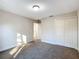 Spacious bedroom with double-door closet and carpet at 16962 Sw 40Th Cir, Ocala, FL 34473