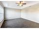 Bright bedroom with carpeted floor and window at 16962 Sw 40Th Cir, Ocala, FL 34473