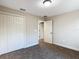 Bedroom with double door closet and carpet at 16962 Sw 40Th Cir, Ocala, FL 34473