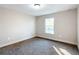 Bright bedroom with window and carpet flooring at 16962 Sw 40Th Cir, Ocala, FL 34473