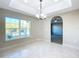 Bright dining area with large window and archway at 16962 Sw 40Th Cir, Ocala, FL 34473
