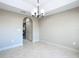 Dining room with tile floors and access to kitchen at 16962 Sw 40Th Cir, Ocala, FL 34473