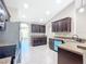 Open kitchen with stainless steel appliances and ample counter space at 16962 Sw 40Th Cir, Ocala, FL 34473