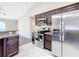 Modern kitchen with stainless steel appliances and island at 16962 Sw 40Th Cir, Ocala, FL 34473