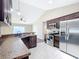 Kitchen boasts stainless steel appliances and breakfast bar at 16962 Sw 40Th Cir, Ocala, FL 34473