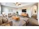 Spacious living room with neutral decor and mid-century furniture at 16962 Sw 40Th Cir, Ocala, FL 34473