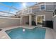 Private backyard with screened pool and patio at 8989 Cabot Cliffs Dr, Davenport, FL 33896