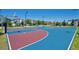 Community basketball court with modern surface at 8989 Cabot Cliffs Dr, Davenport, FL 33896