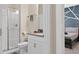 Clean bathroom with walk-in shower, toilet, and vanity at 8989 Cabot Cliffs Dr, Davenport, FL 33896