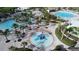 Resort-style community pool with water features and spacious deck at 8989 Cabot Cliffs Dr, Davenport, FL 33896