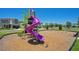Community playground with modern equipment at 8989 Cabot Cliffs Dr, Davenport, FL 33896